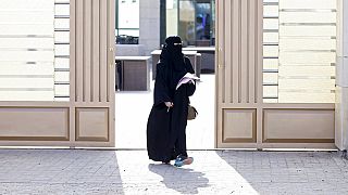 Saudi Arabian women vote and stand as candidates in historic day for Islamic kingdom