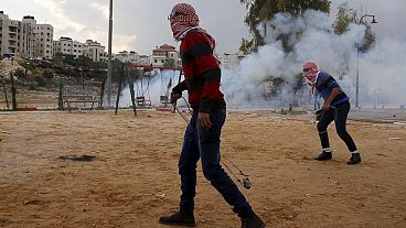 Palestinians and Israeli soldiers clash in Ramallah