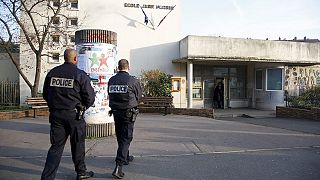 French police hunt for man who stabbed teacher as a "DAESH warning"