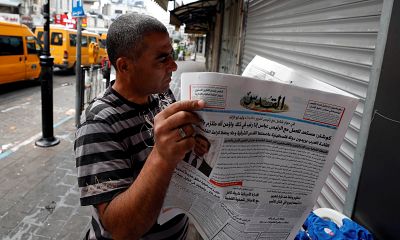 A man reads the Palestinian newspaper Al Quds that published an interview with Jared Kushner, U.S. President Donald Trump\'s senior adviser, in Ramallah in the occupied West Bank, on Sunday.