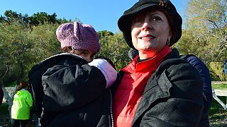 "Have courage, you'll make it:" Susan Sarandon comforts Iranian refugee on Lesbos