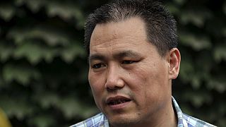 Pu Zhiqiang: Chinese human rights lawyer gets suspended jail term