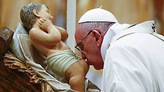 Pope urges return to simplicity at Christmas Eve mass