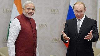 Putin and Modi sign nuclear, helicopter deals in Moscow