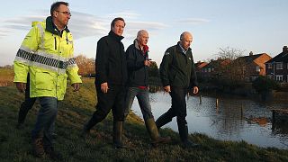 UK: Cameron to review gov't spending on flood defenses