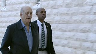 Former Israeli PM Ehud Olmert has bribery conviction partly overturned