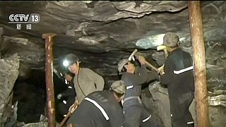 China: 11 rescued from mine collapse, 18 trapped