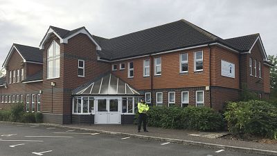 A police officer stands outside Amesbury Baptist Church in Amesbury, Wiltshire.