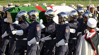 Thousands of Algerians gather for funeral of independence hero