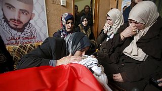 West Bank crowds mourn 14 killed in recent violence