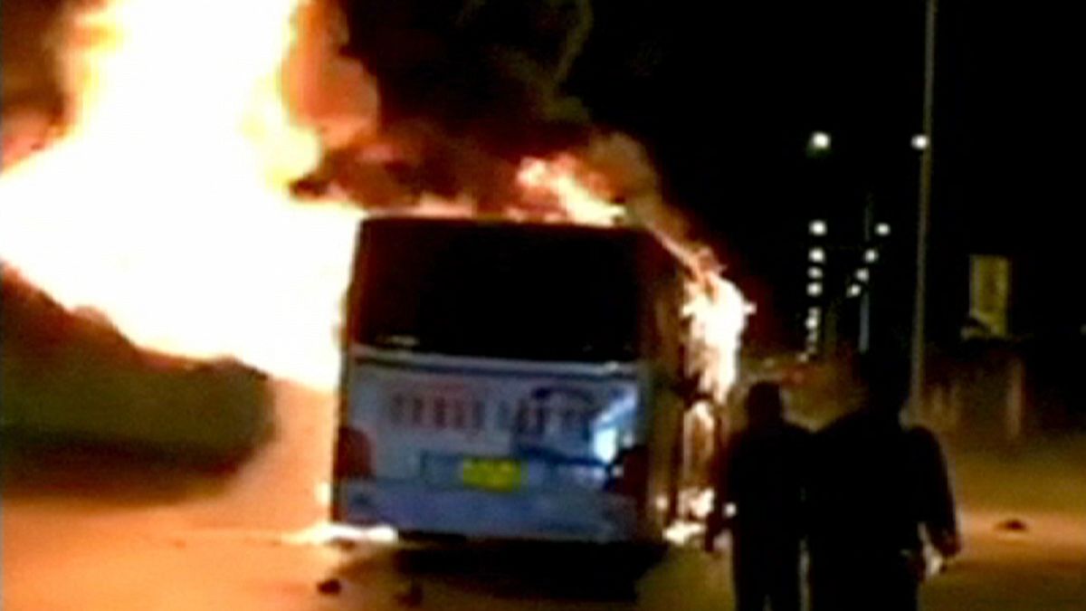 Fourteen die in China bus fire