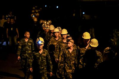 Hundreds of rescuers with equipment continue the rescue operation at the Tham Luang Nang Non cave on July 06, 2018 in Chiang Rai, Thailand.