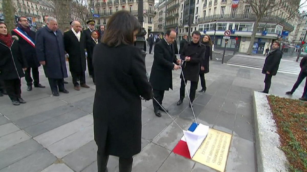 French President unveils plaque in Paris