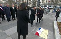 French President unveils plaque in Paris
