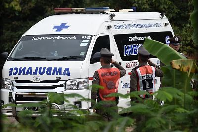An ambulance exits from the Tham Luang cave area as operations continue for nine people trapped at the cave in Khun Nam Nang Non Forest Park in the Mae Sai district of Chiang Rai province, Thailand, on July 9, 2018.