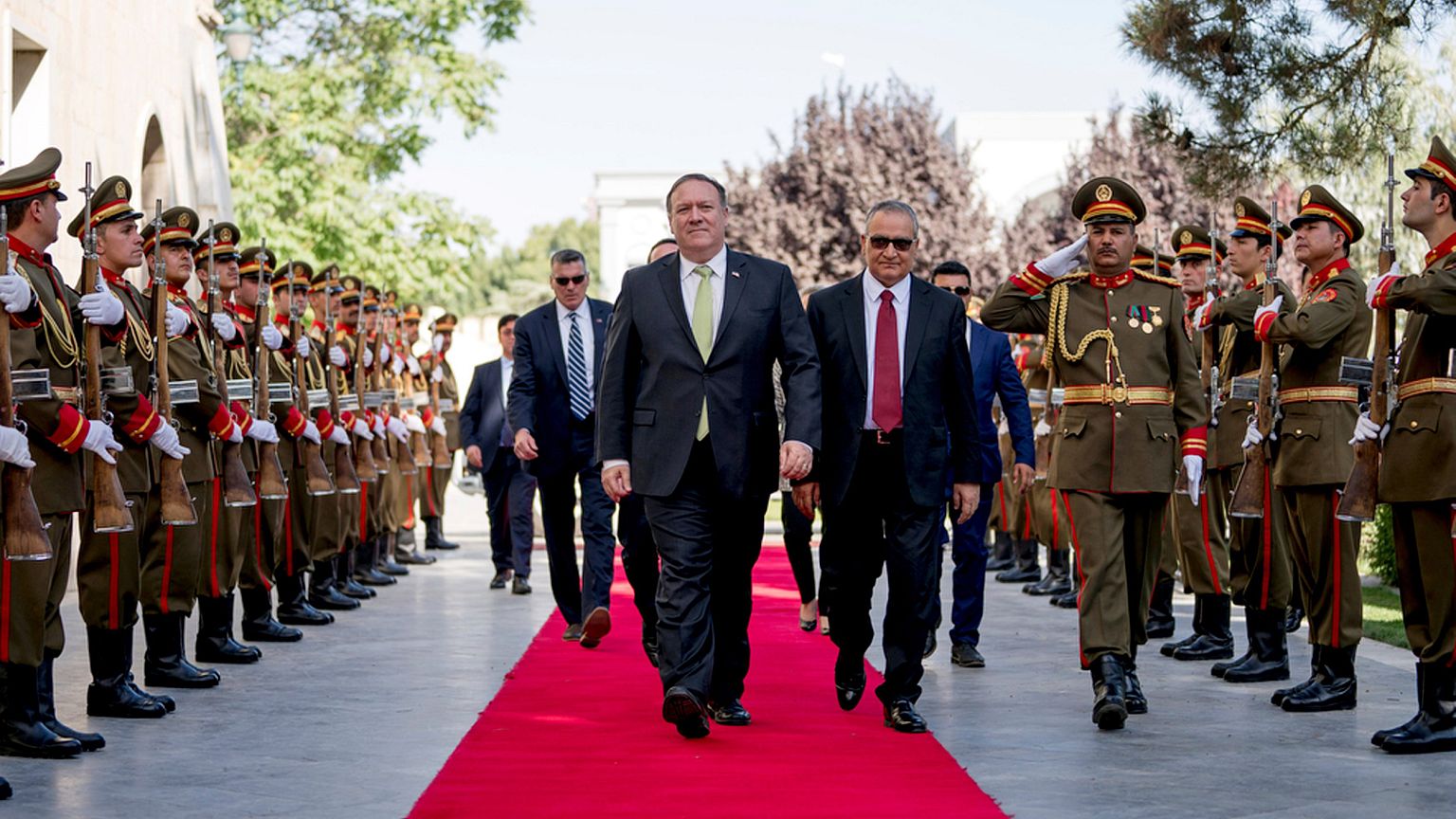 Image: U.S. Secretary of State Mike Pompeo is greeted by Chief of Staff Abd