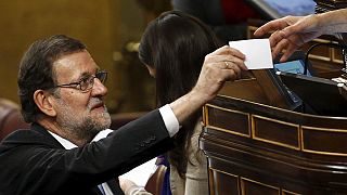 Rajoy calls for broad coalition as split parliament reconvenes