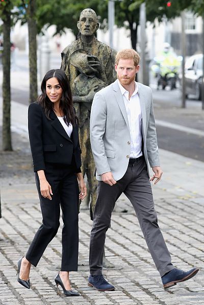 Meghan\'s pantsuit was chic but also appropriately subdued for their visit to the famine memorial in Dublin. 