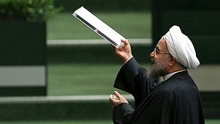 Iran hails lifting of sanctions, but US is more cautious