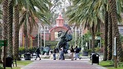 Image: People walk past a bronze elephant on the grounds of the Audubon Zoo