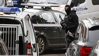 Belgian police make two more arrests as part of Paris attack manhunt