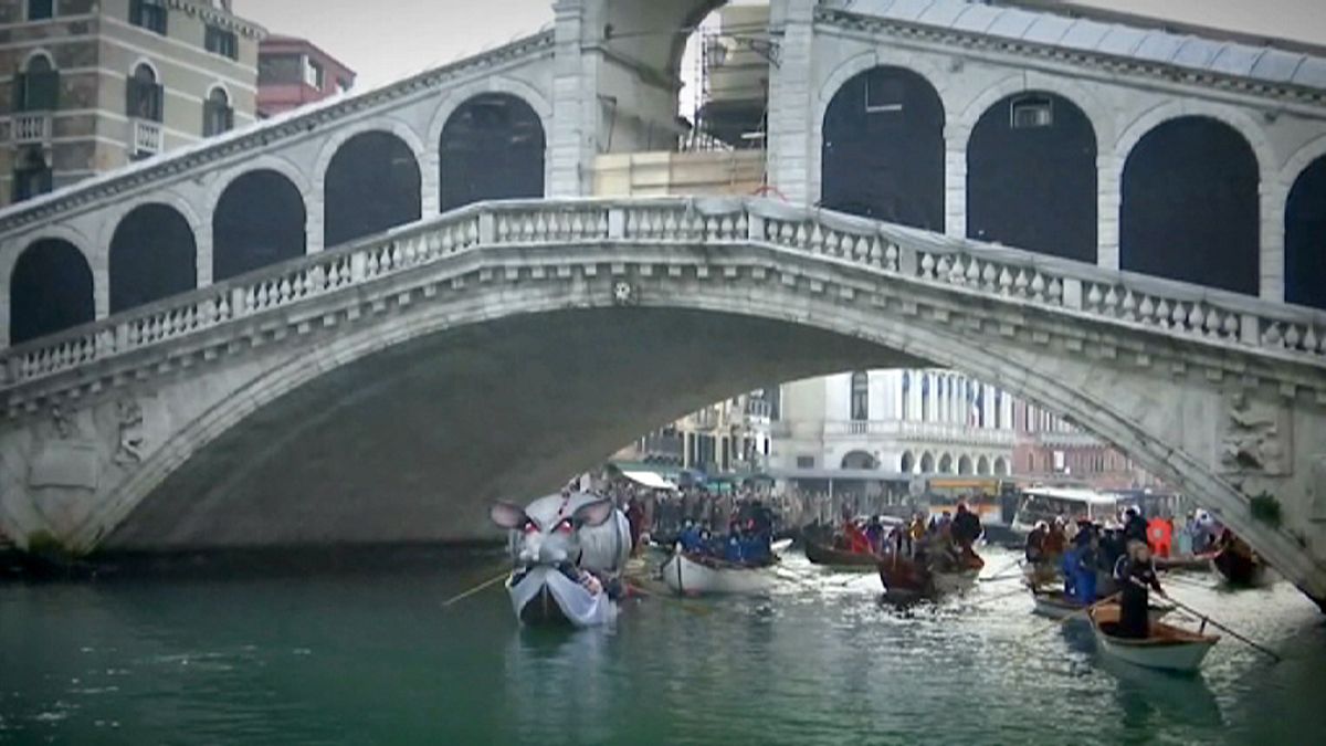 Venice awash with masks and costumes as carnival gets underway