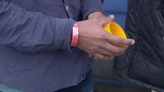 Red wristband plan for migrants dropped in UK