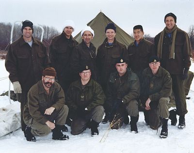 Mike Massimno, top right, with astronaut colleagues during extreme environment team building training with canadian army instructors, bottom row,  in Cold Lake, Canada in 2000.