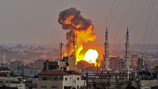 Image: A fireball exploding in Gaza City during Israeli bombardment on July