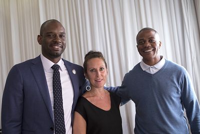 Professor Baz Dreisenger with her first graduate Devon Simmons, left, and South African recent graduate and ex-offender Morgan Makaluza, right.