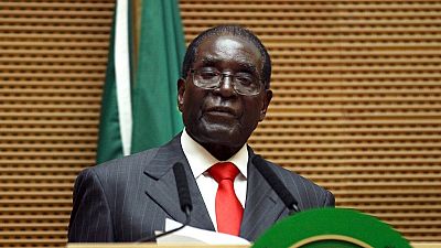President Mugabe sued for clinging to power
