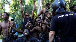 Hundreds of cheering migrants storm border fence, enter Europe