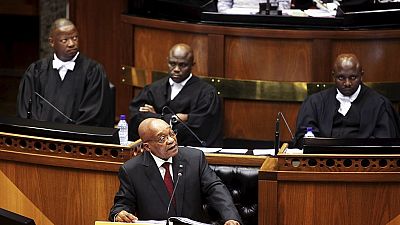 Zuma acknowledges gravity of South Africa's economy amid jeers from opposition MPs