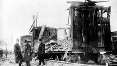 Police investigate the explosion of a munition plant at Black Tom Island