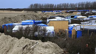 Evacuación parcial de la "Jungla", el campo de inmigrantes en Calais