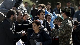 Migrants bussed back to Athens from border