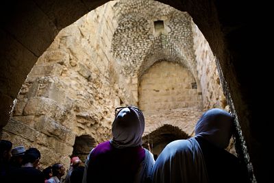 Students of the U.S.-based World Monuments Fund\'s training program for conservation stonemasonry on a field trip to the historic 12th-century Ajloun Castle in Jordan.