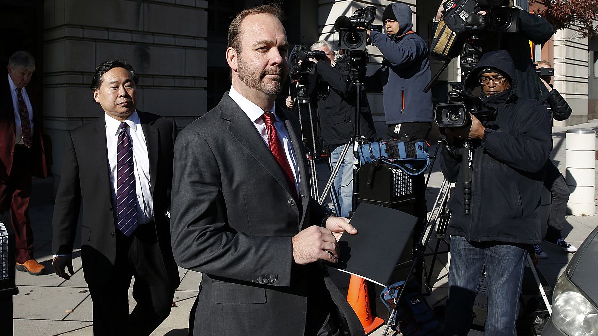 Rick Gates departs after a bond hearing at U.S. District Court in Washingto