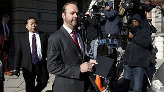 Rick Gates departs after a bond hearing at U.S. District Court in Washingto