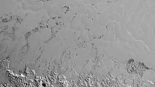 NASA releases image of Pluto's own 'Himalayas'
