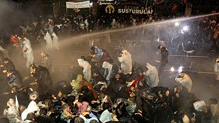 Turkish police turn water cannon and tear gas on protesters in Istanbul