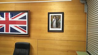 Framed photo of Queen Elizabeth II and Prince Philip, in community centre i