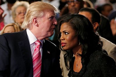 Republican presidential nominee Donald Trump and Omarosa Manigault attend a church service in Detroit on Sept. 3 2016.