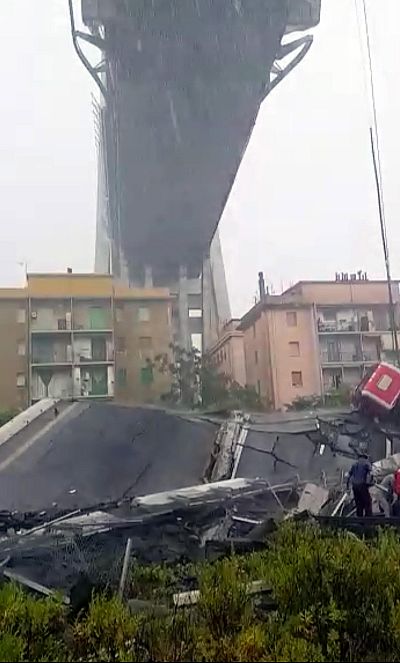 Rescue teams at the site of a collapsed bridge in Genoa, Italy.