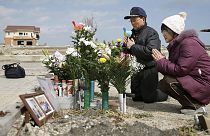 ادای احترام ژاپنی ها به قربانیان در سالروز وقوع سونامی و فاجعه اتمی فوکوشیما