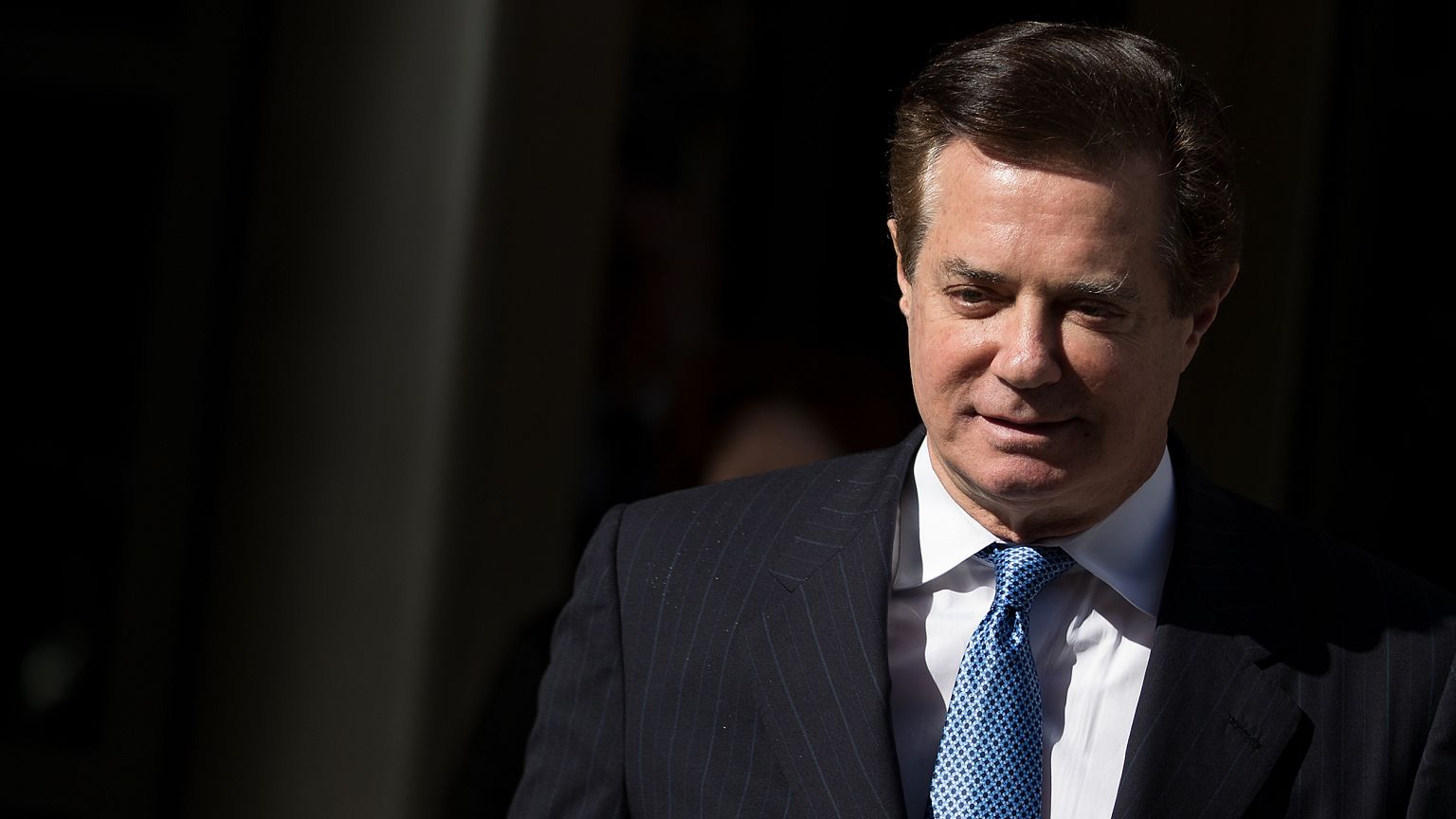 Image: Paul Manafort exits the E. Barrett Prettyman Federal Courthouse in W
