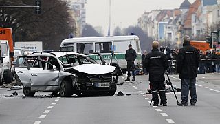 Car explodes in busy Berlin street at rush hour