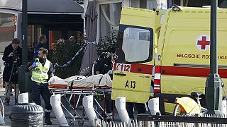 Police hunt gunmen after several police officers injured in Brussels shooting