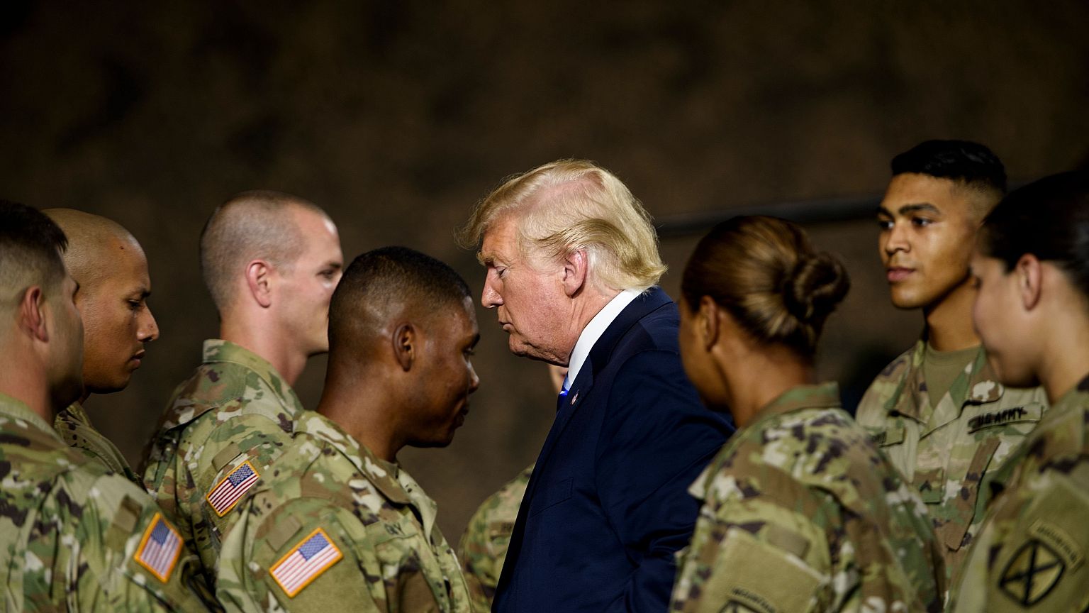 US President Donald Trump leaves after signing the John S. McCain National 