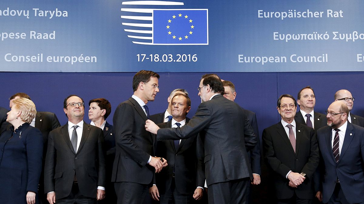 EU leaders begin negotiations on controversial refugee deal